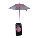 Magnetic phone umbrella sun shade attached to the back of a phone with the finger ring visible