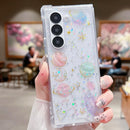 Galaxy Z Fold 7 clear glitter planet case with stars and moons